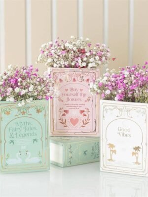 white book shaped vase